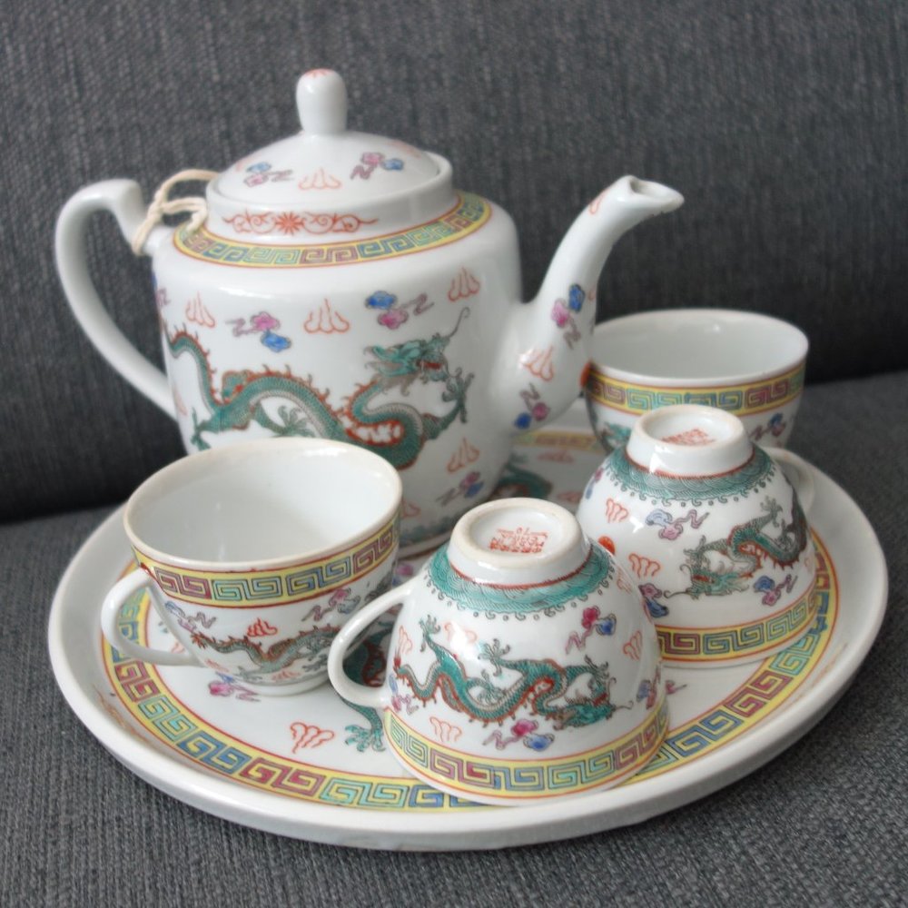 Ceramic Dragon Design Tea Pot (1),  Tea Cups (4) and Tray/Plate (1)